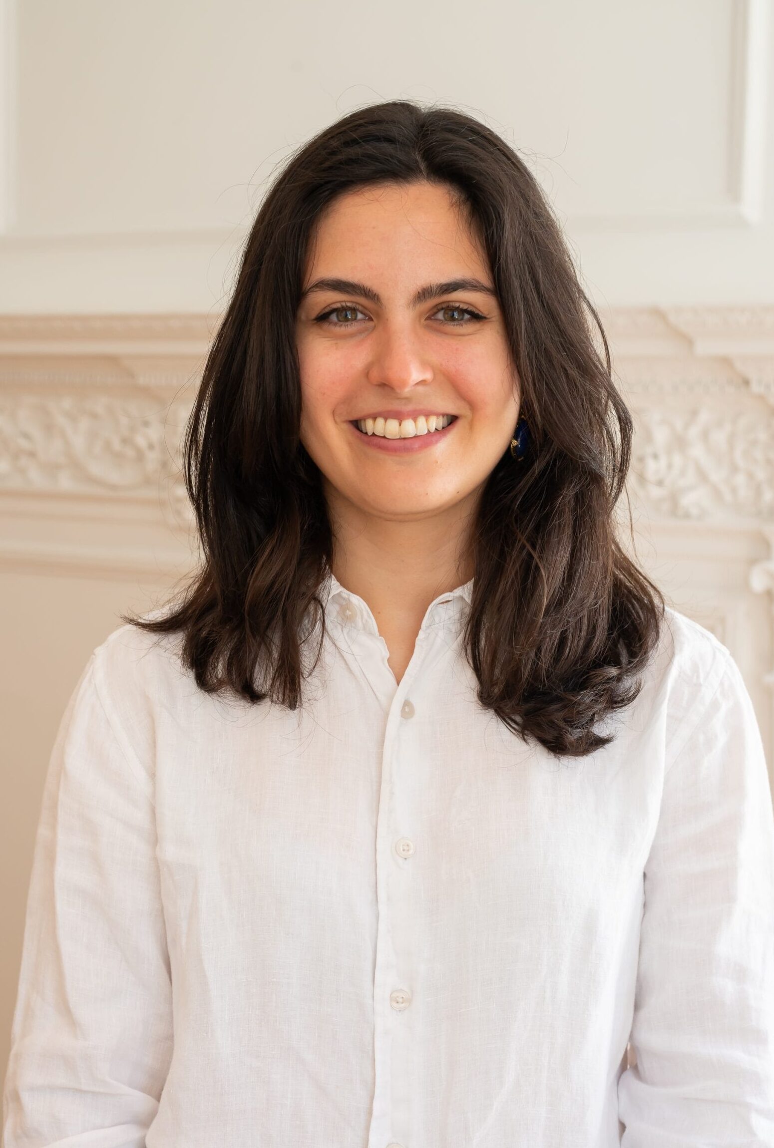 Image: Yasmeen Safaie, Consultant, BOP Consulting, standing in the BOP offices.