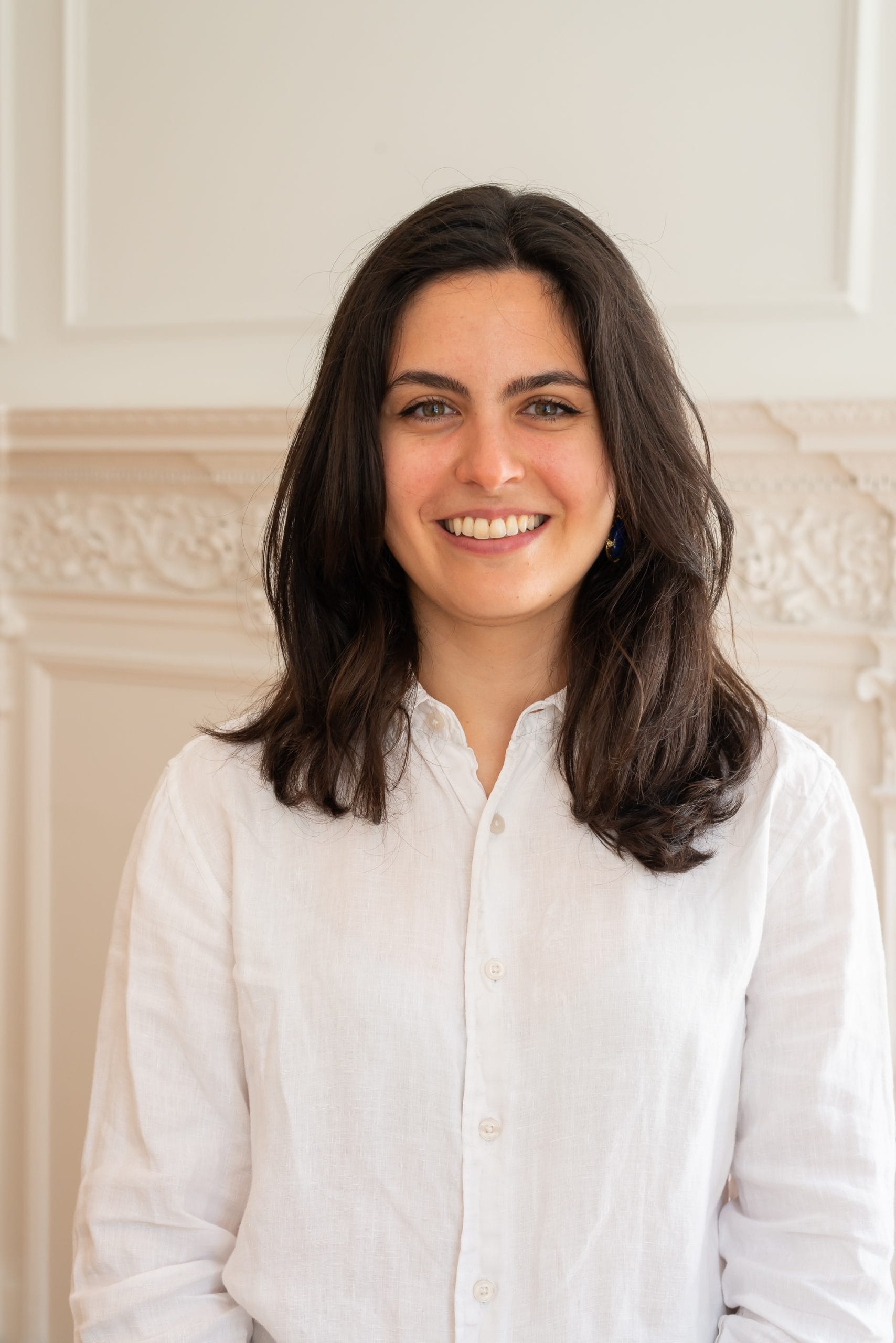 Image: Yasmeen Safaie, Consultant, BOP Consulting, standing in the BOP offices.